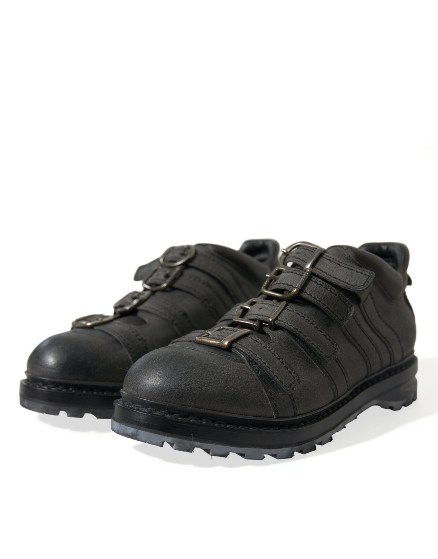 Botas negras de cuero con tiras al tobillo