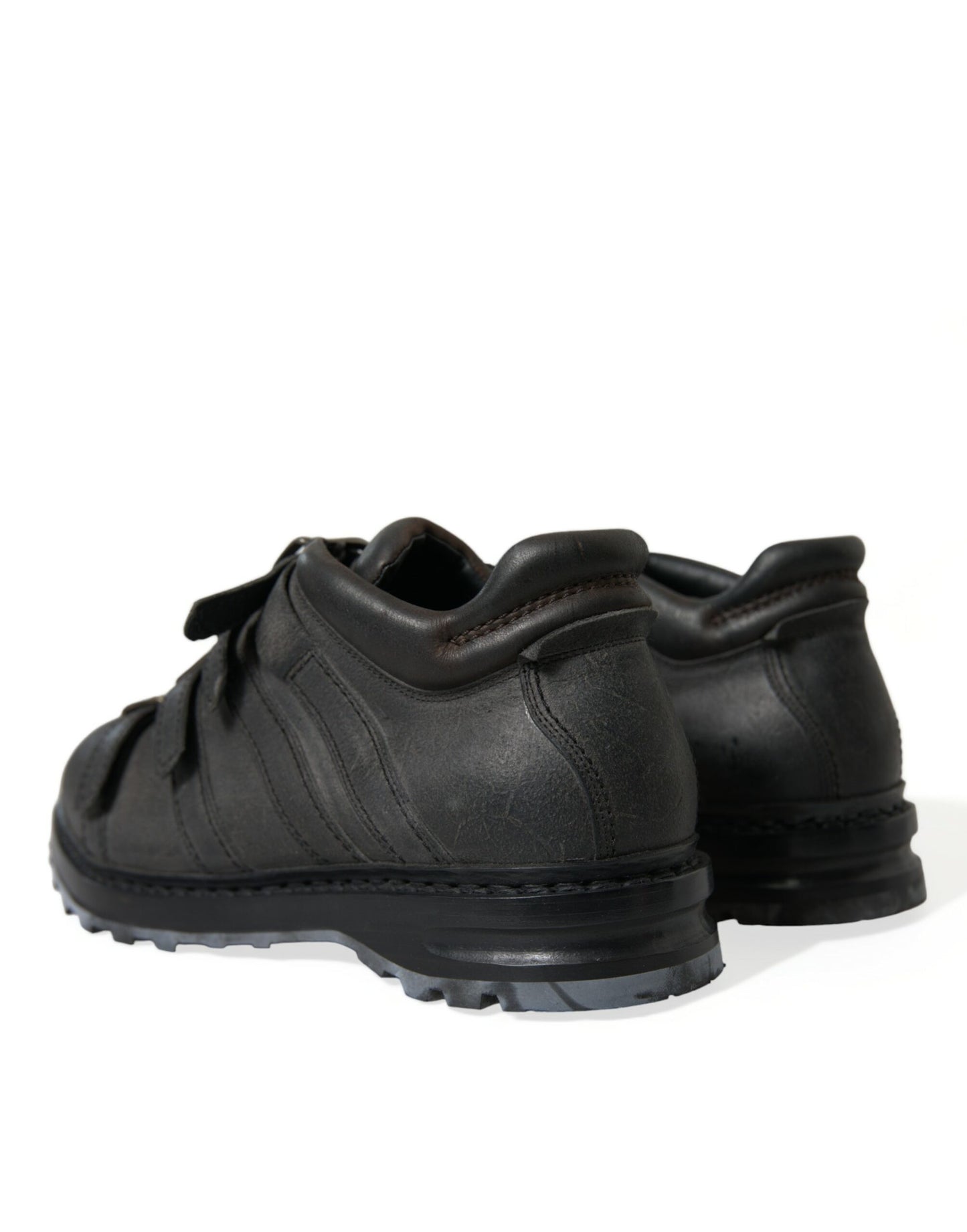 Botas negras de cuero con tiras al tobillo