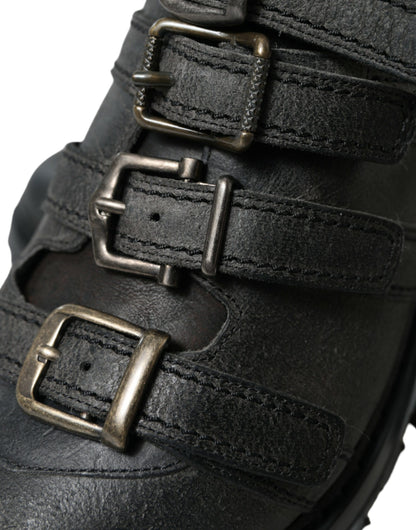 Botas negras de cuero con tiras al tobillo