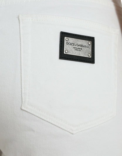 Elegantes jeans blancos de cintura media con corte tobillero