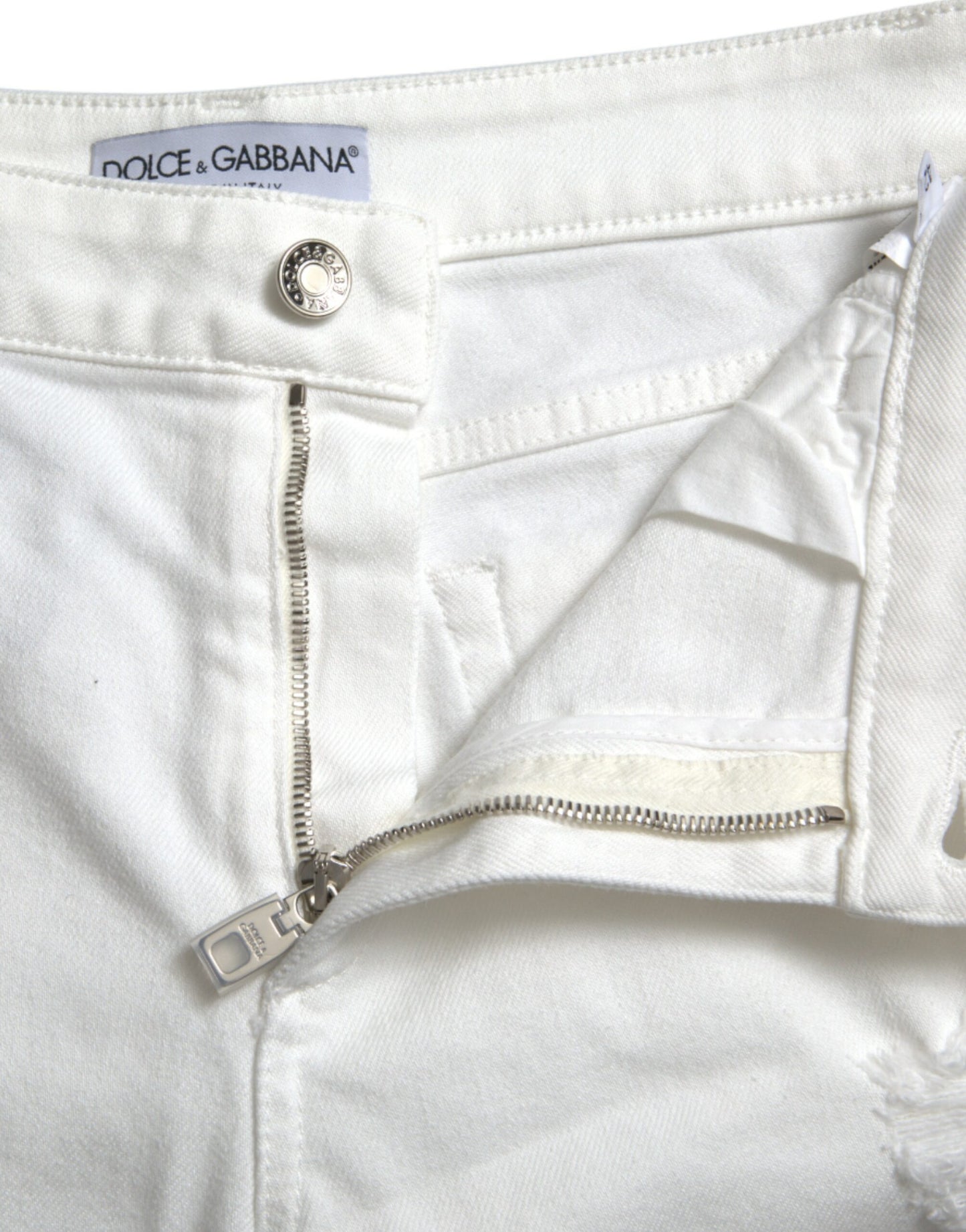 Elegantes jeans blancos de cintura media con corte tobillero