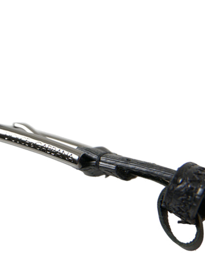 Cinturón elegante de cuero negro con hebilla de metal