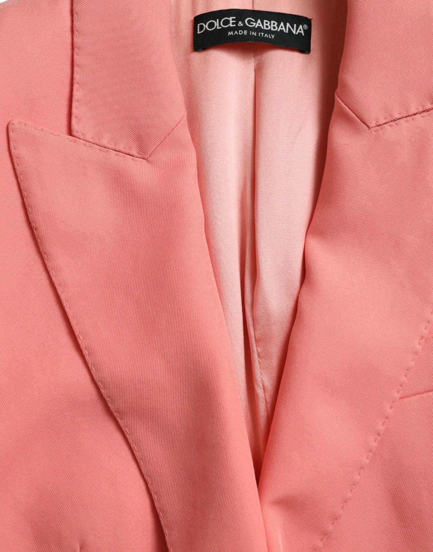 Blazer elegante rosa con solapa de pico