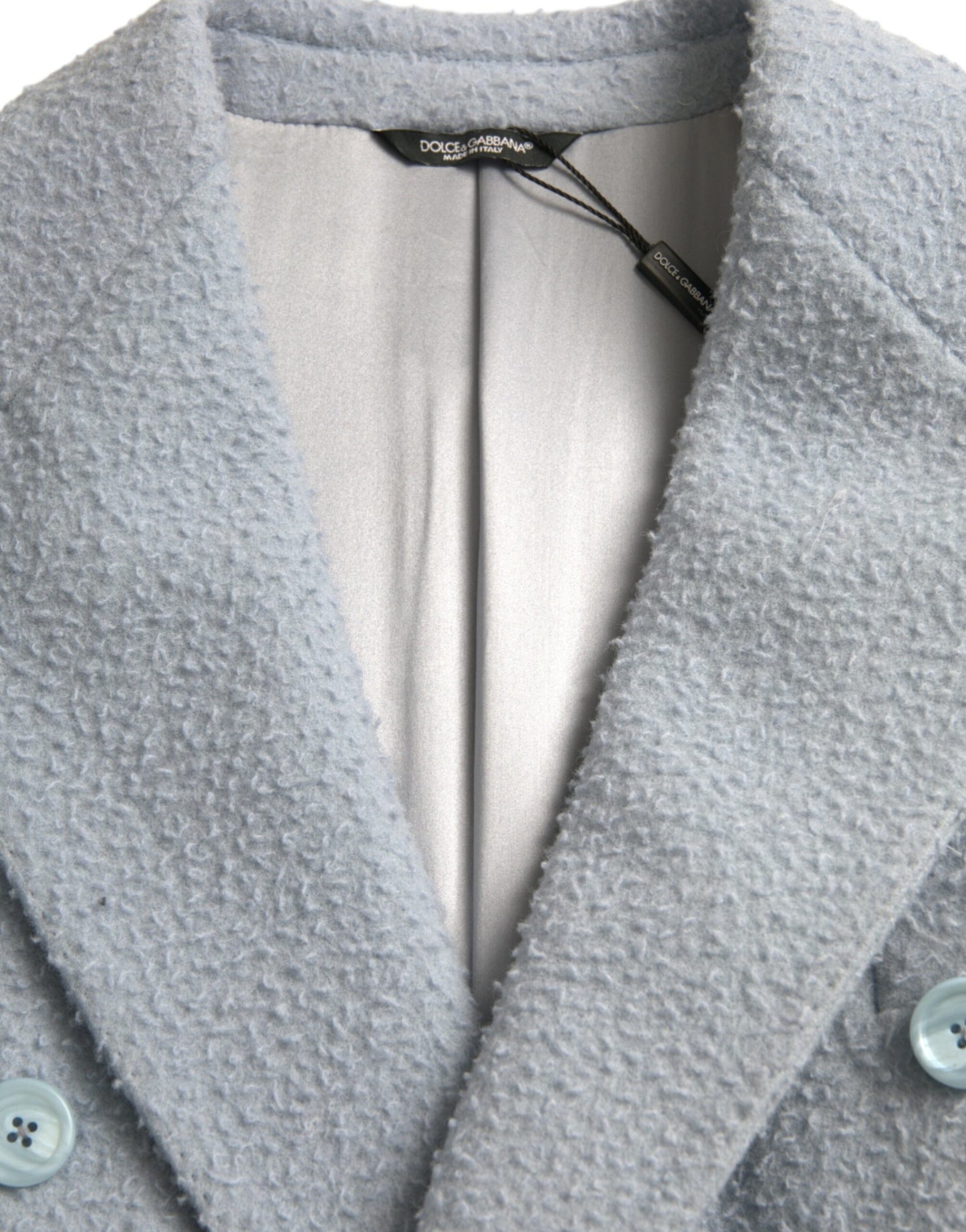 Chaqueta gabardina larga azul de doble botonadura