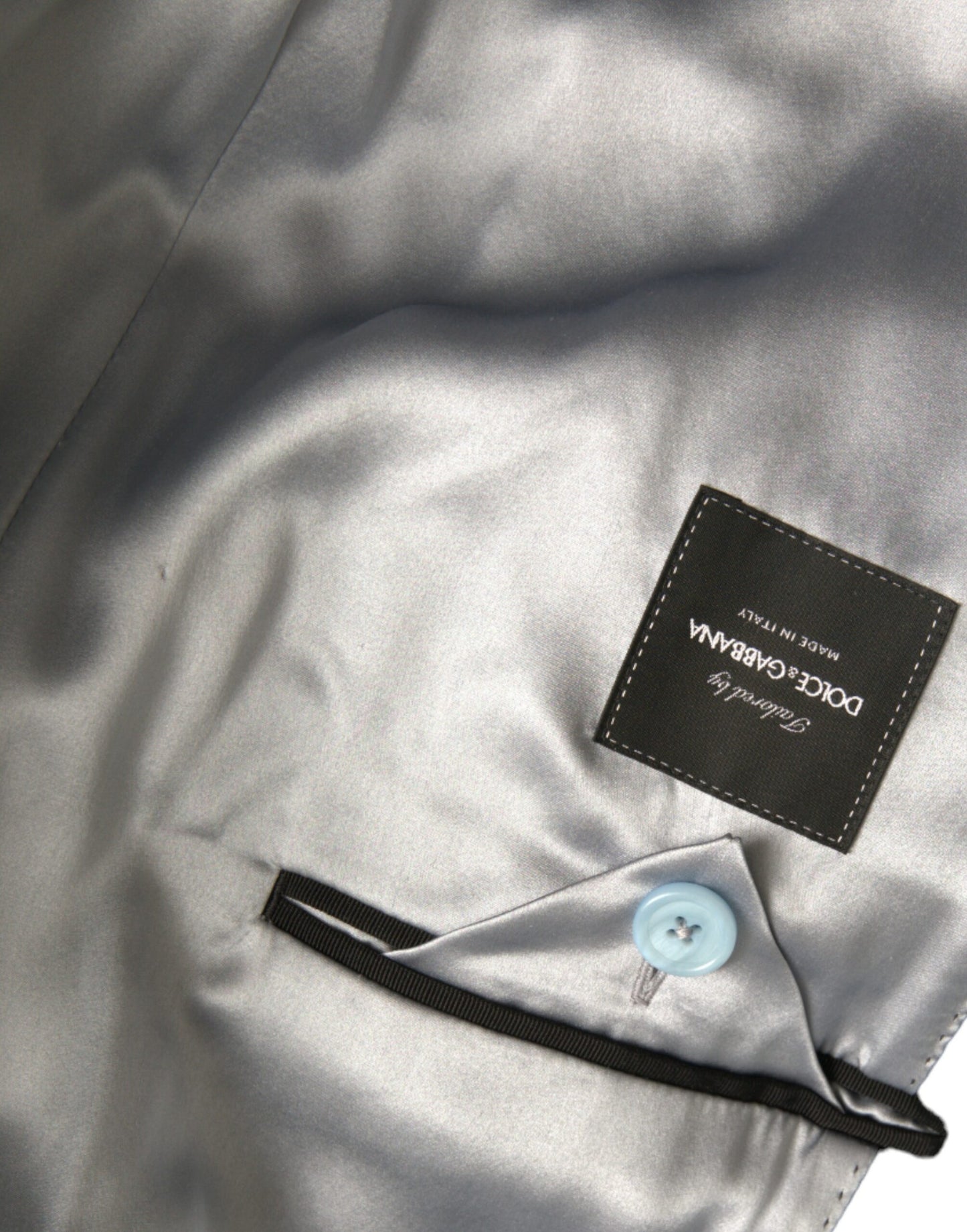 Chaqueta gabardina larga azul de doble botonadura