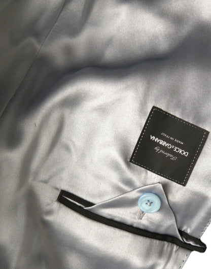 Chaqueta gabardina larga azul de doble botonadura