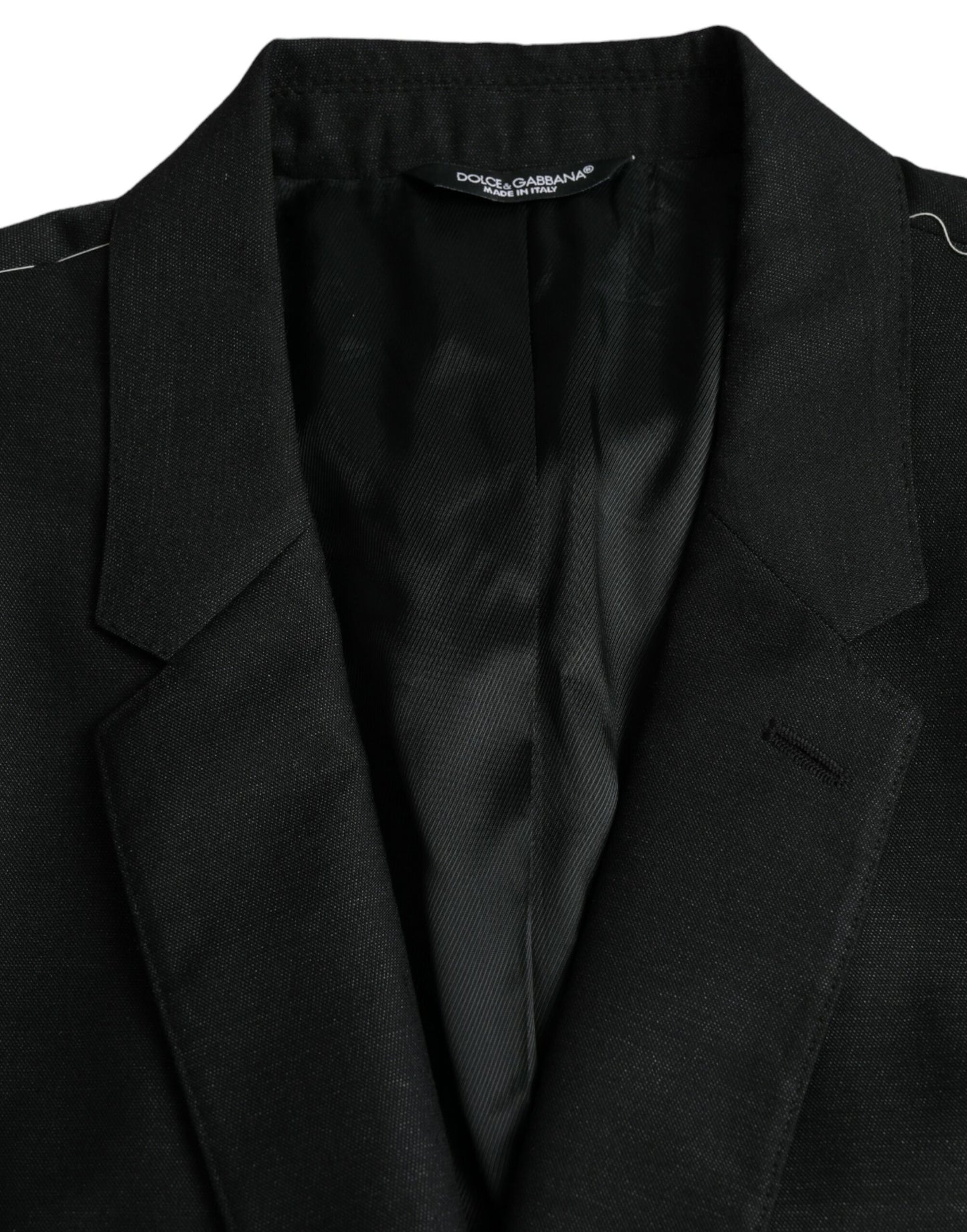 Blazer de lana negra con muesca y botonadura sencilla
