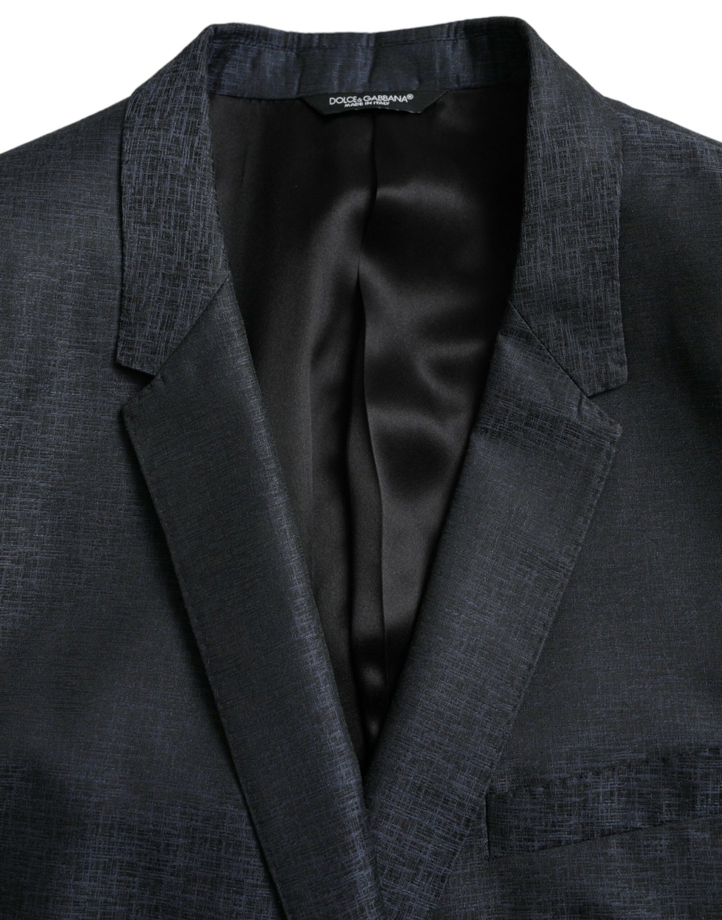 Blazer de lana azul dorado con botonadura sencilla