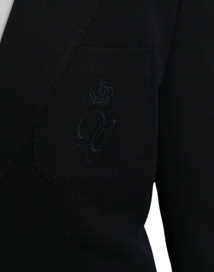 Blazer de lana negra con muesca y botonadura sencilla