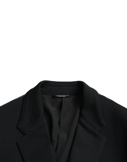 Blazer de lana negra con muesca y botonadura sencilla