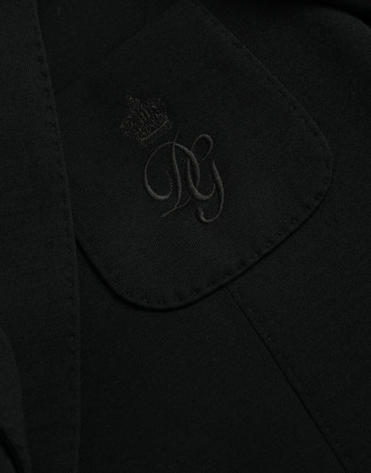 Blazer de lana negra con muesca y botonadura sencilla