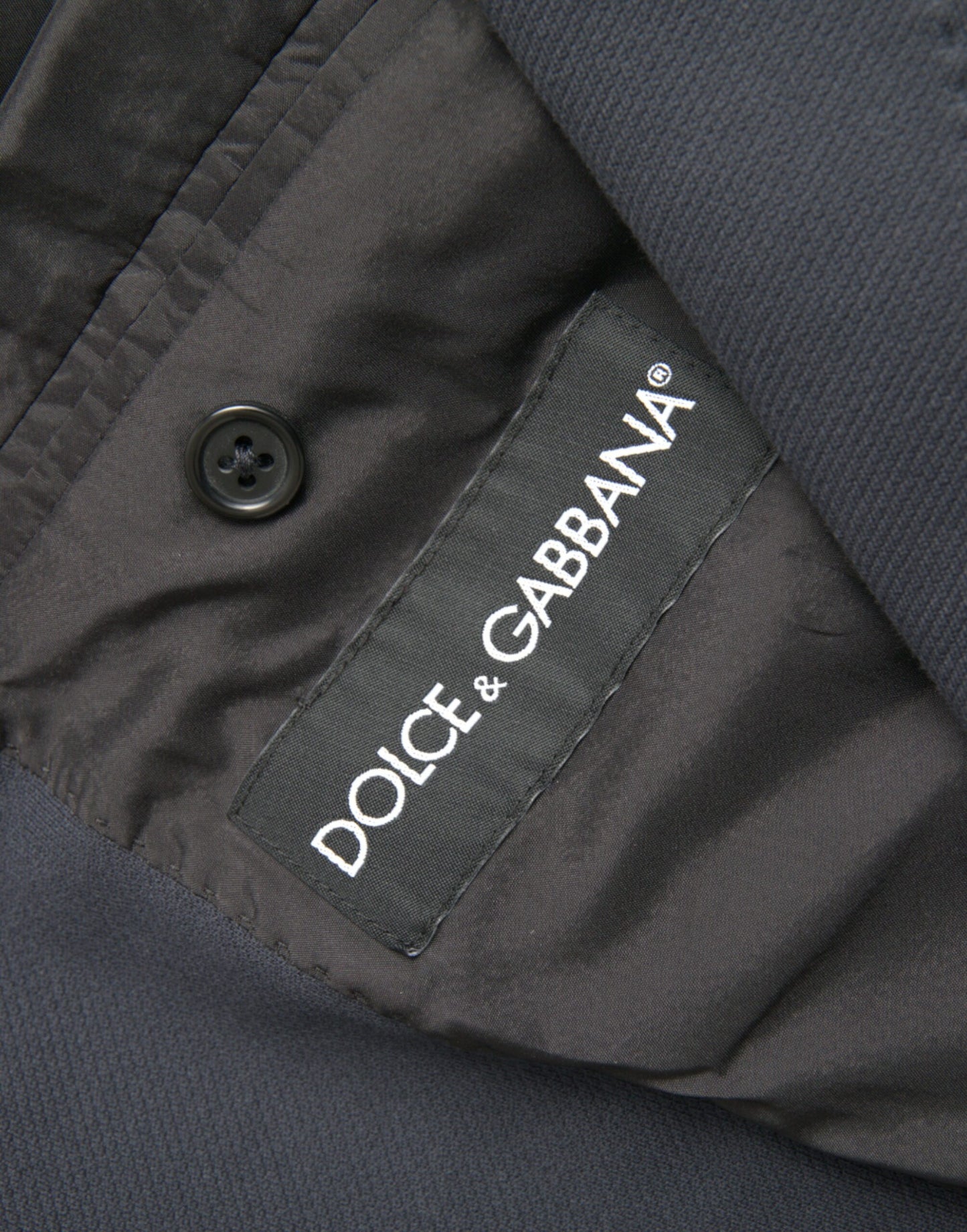 Blazer de algodón azul oscuro con botonadura sencilla