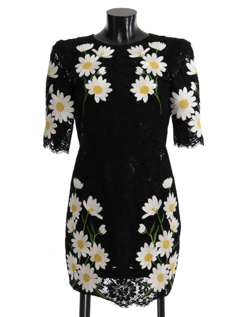 Vestido negro con encaje floral y bordado de manzanilla