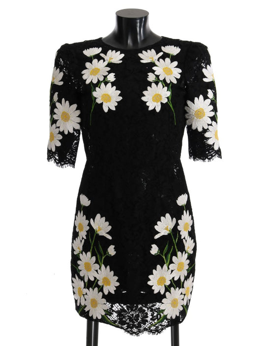 Vestido negro con encaje floral y bordado de manzanilla