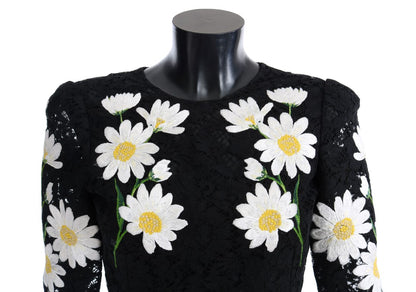 Vestido negro con encaje floral y bordado de manzanilla