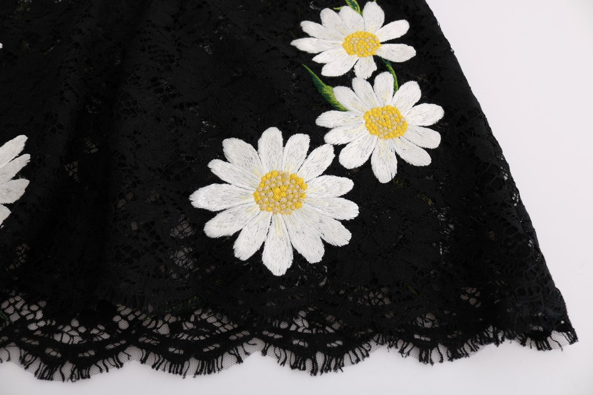Vestido negro con encaje floral y bordado de manzanilla