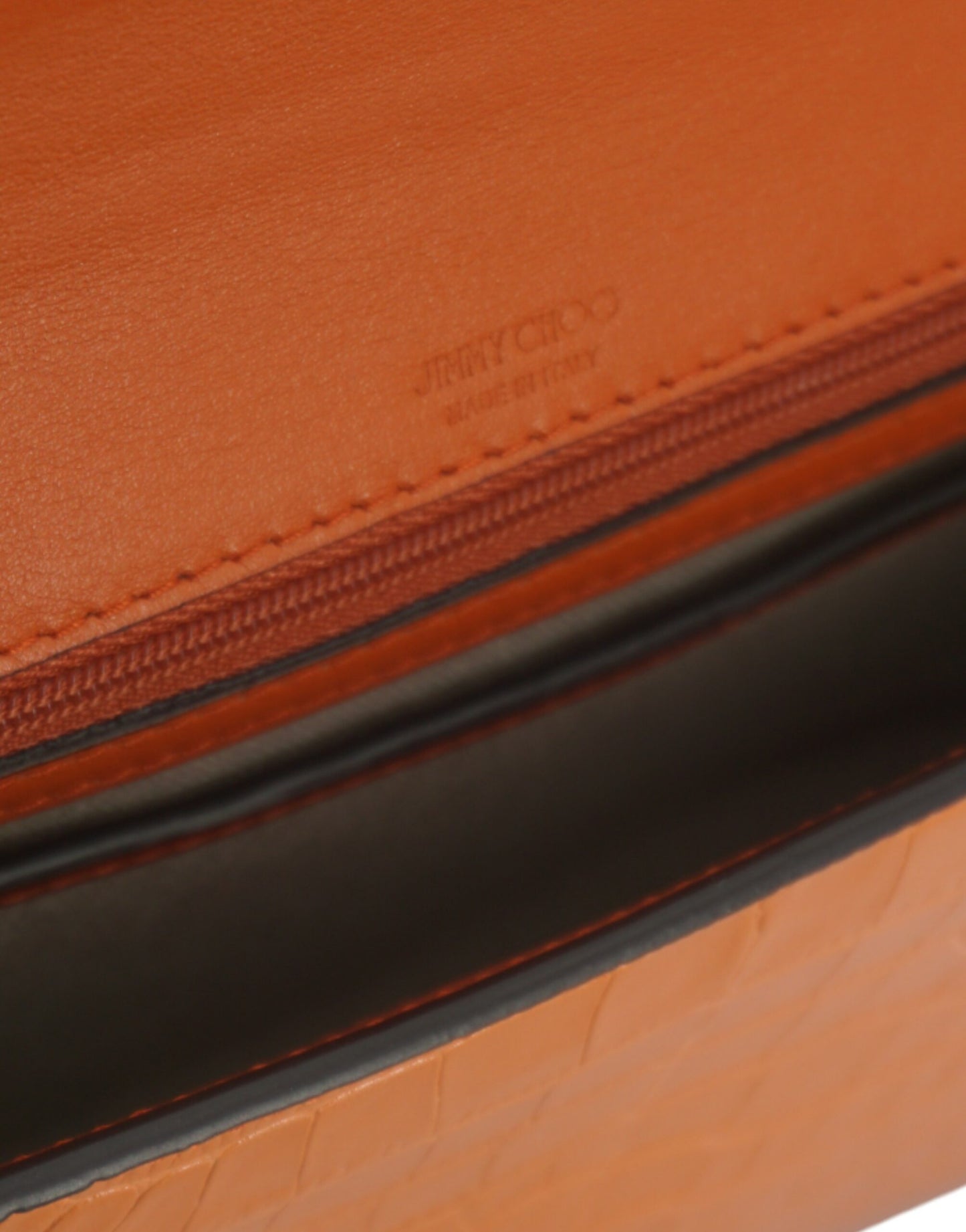 Bolso de hombro de piel color naranja ámbar