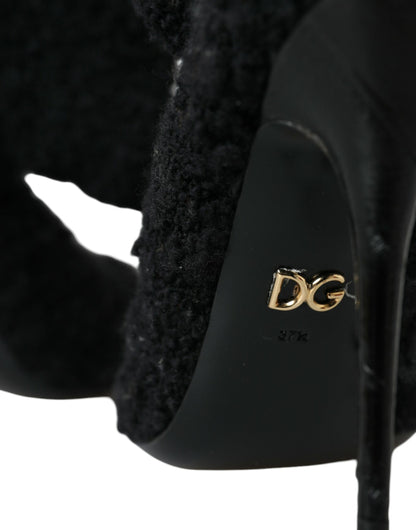 Botas negras de tacón de aguja a media pantorrilla