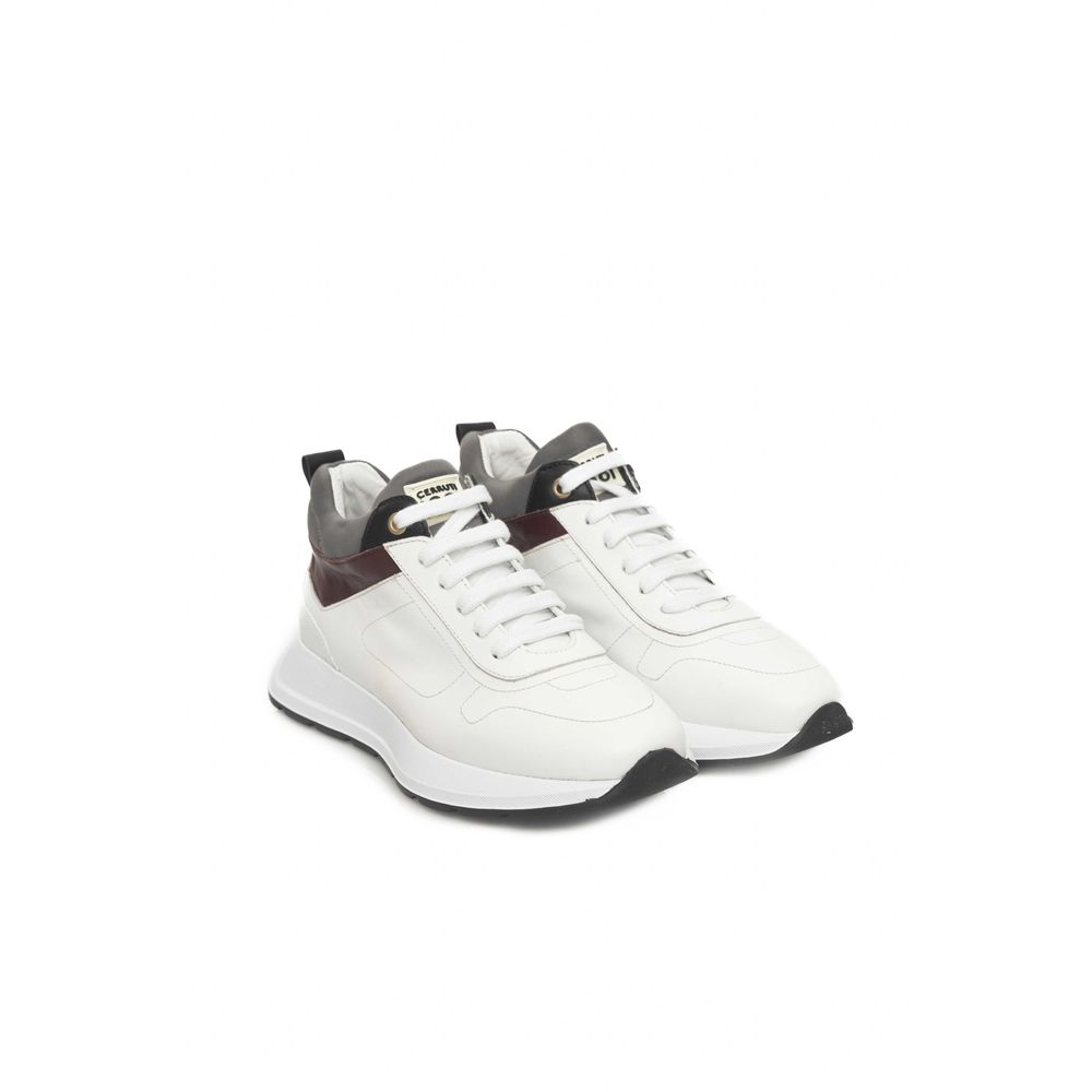Zapatillas blancas de piel para mujer
