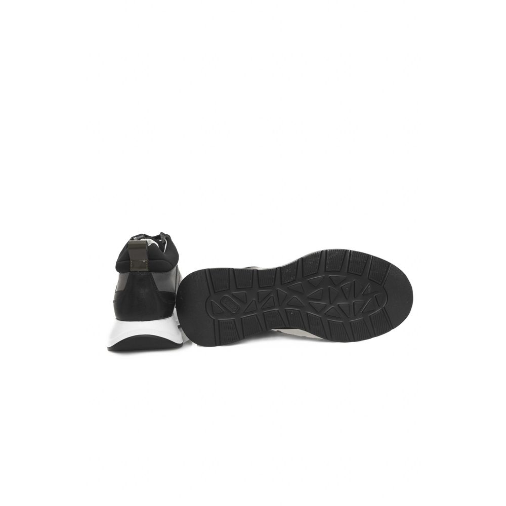 Zapatillas de piel negra para mujer