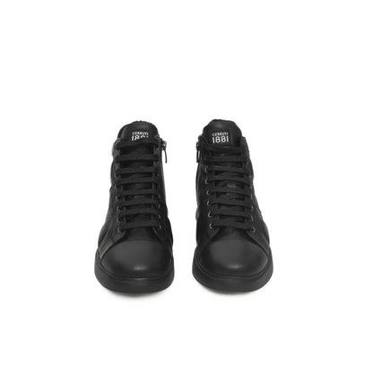 Zapatillas de piel negra para mujer