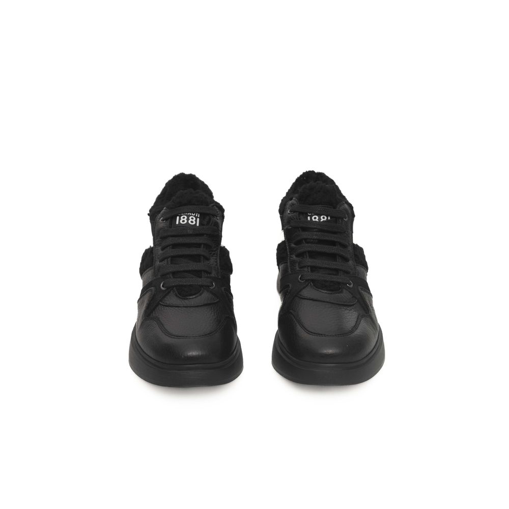 Zapatillas de piel negra para mujer