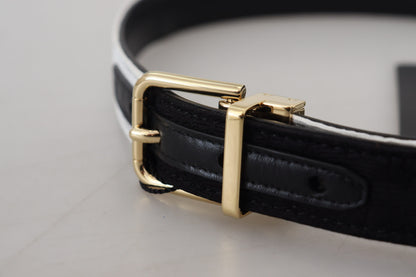 Cinturón con hebilla de metal dorado y patchwork blanco y negro