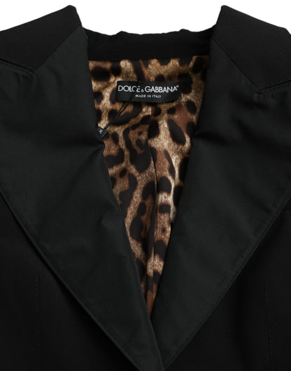 Chaqueta corta de poliéster negro con mangas abullonadas