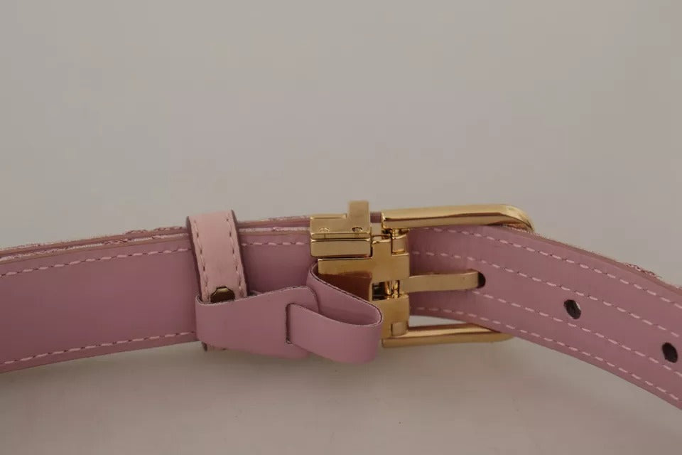 Cinturón con hebilla metálica dorada y bordado en jacquard rosa