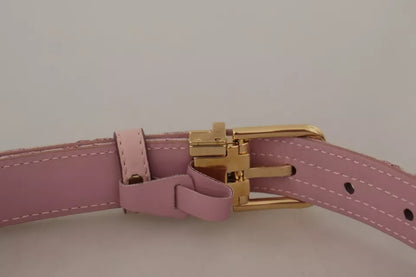 Cinturón con hebilla metálica dorada y bordado en jacquard rosa