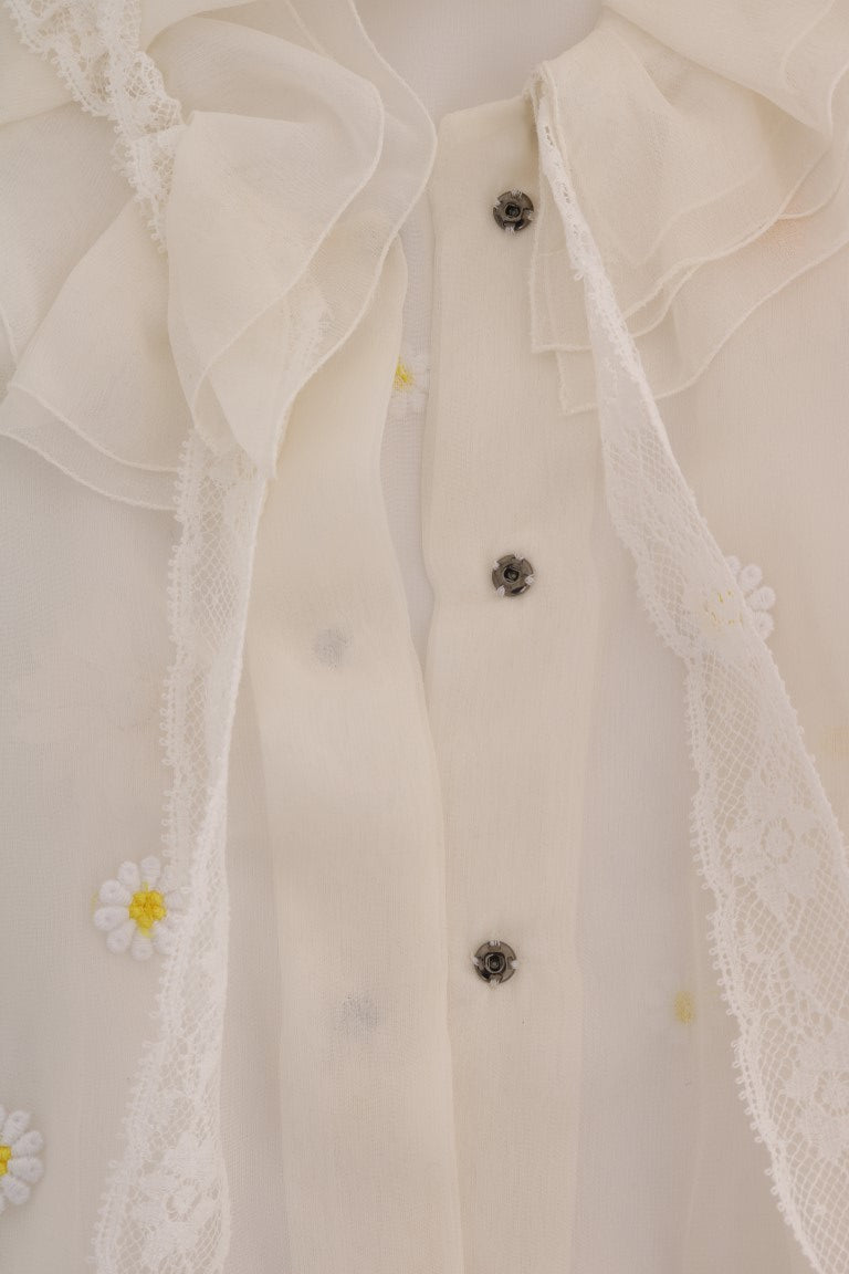 Elegante blusa de seda blanca con margaritas