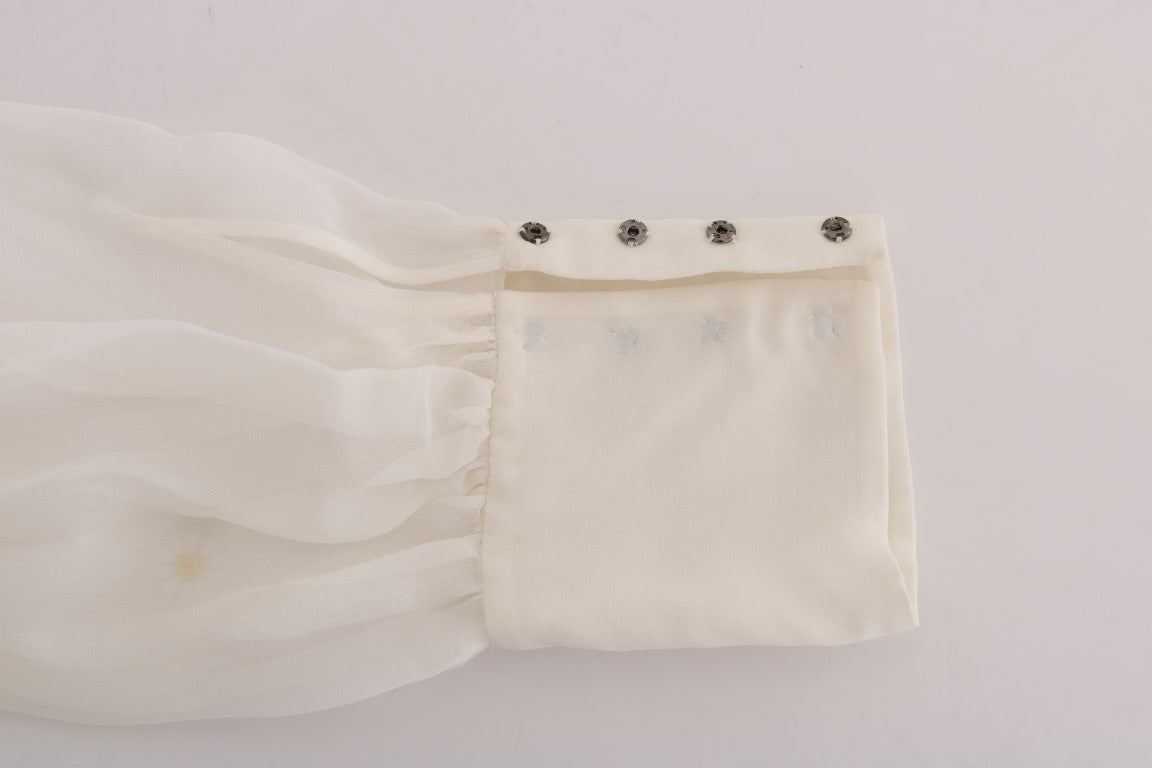 Elegante blusa de seda blanca con margaritas