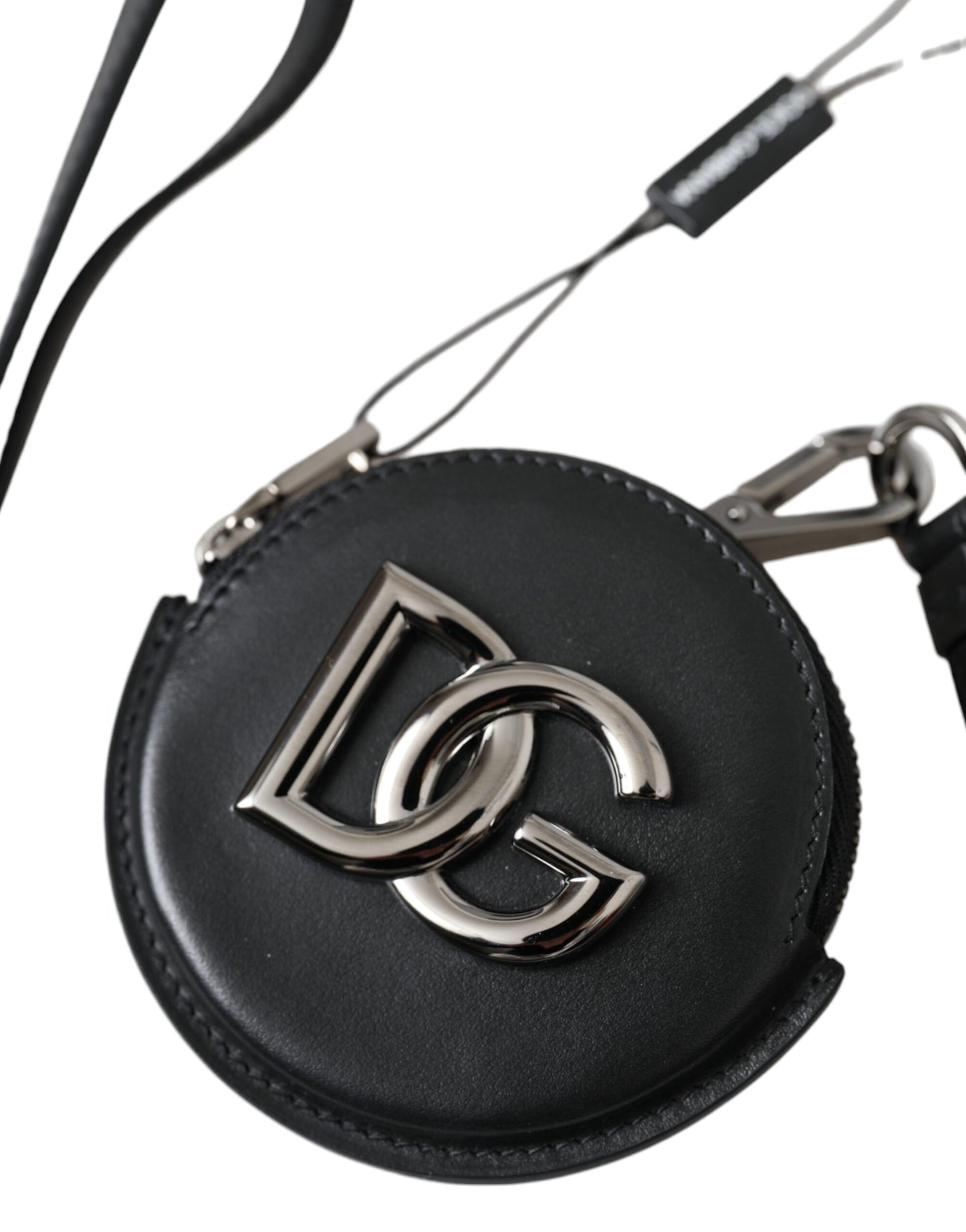 Monedero redondo de cuero negro con logotipo de DG y cordón