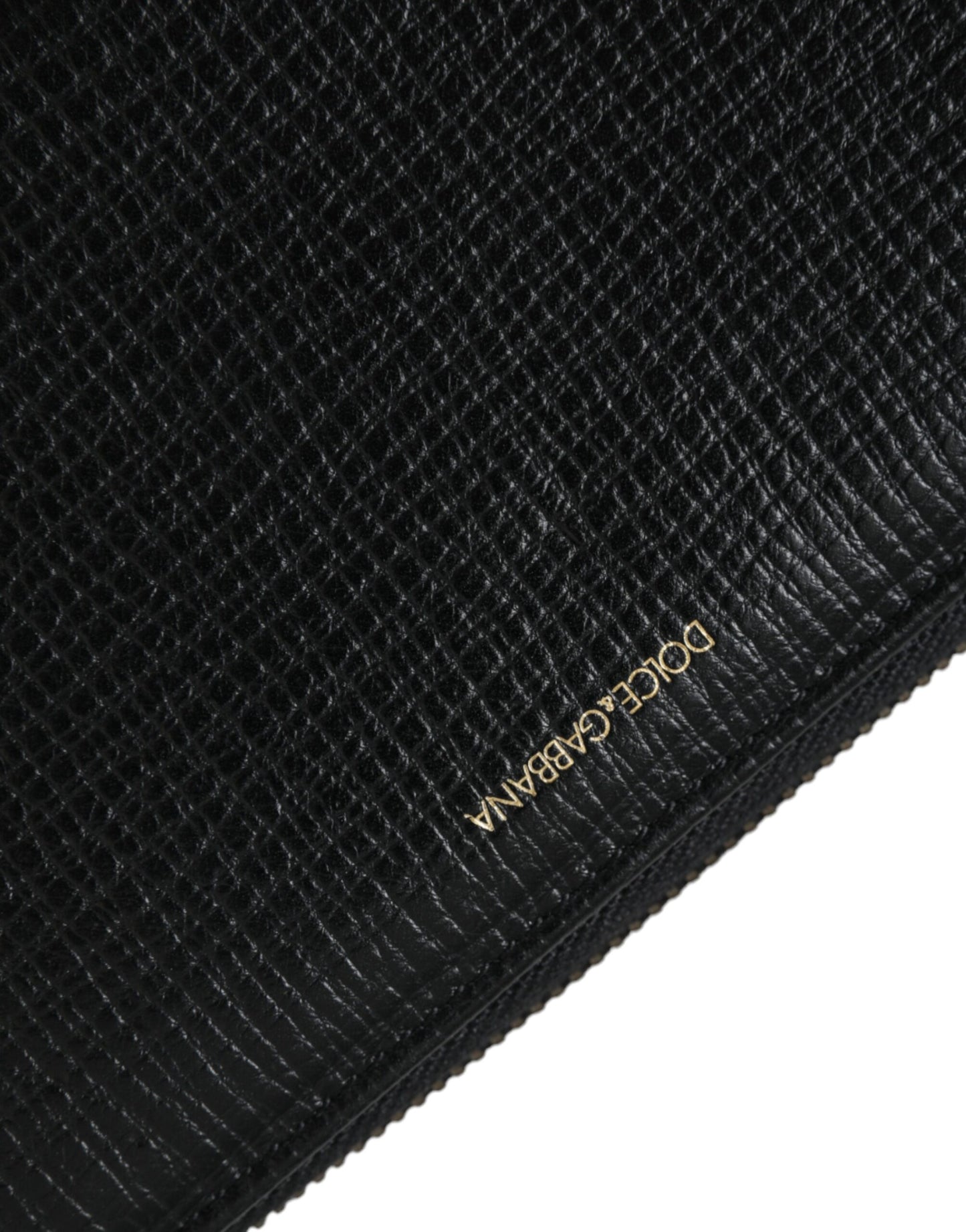 Cartera continental de cuero negro con cremallera y parche del logotipo