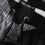 Traje de baño corto con estampado de camuflaje multicolor y logotipo de DG