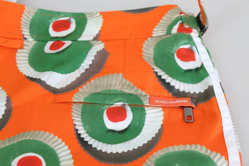 Trajes de baño cortos de playa con cupcakes naranjas