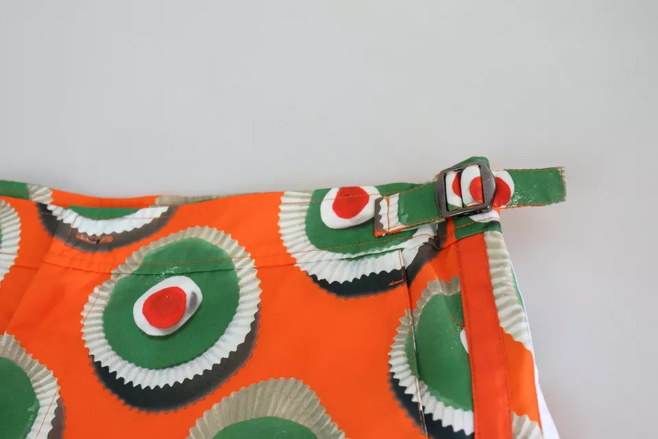 Trajes de baño cortos de playa con cupcakes naranjas