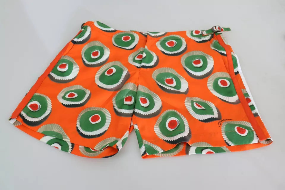 Trajes de baño cortos de playa con cupcakes naranjas
