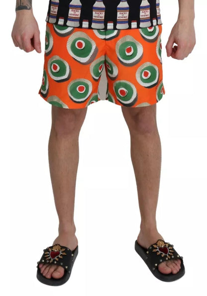 Trajes de baño cortos de playa con cupcakes naranjas
