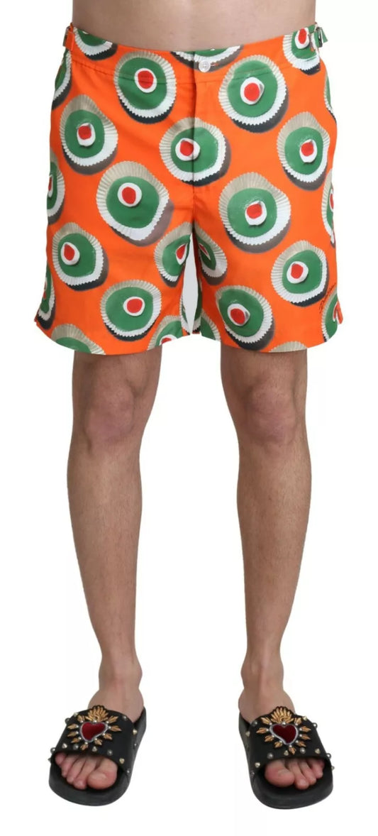 Trajes de baño cortos de playa con cupcakes naranjas