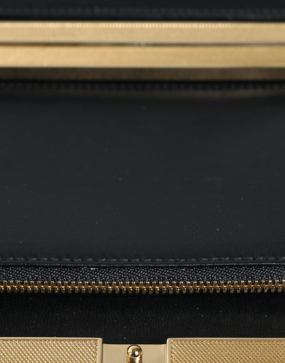 Bolso de noche tipo clutch con marco dorado y flores multicolores
