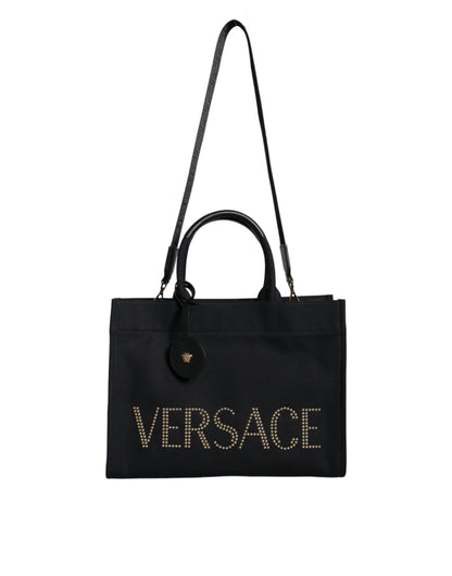 Bolso bandolera de lona negra con asa superior, de cuero y logotipo