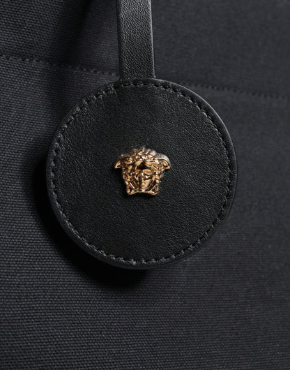 Bolso bandolera de lona negra con asa superior, de cuero y logotipo