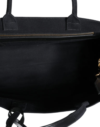 Bolso bandolera de lona negra con asa superior, de cuero y logotipo