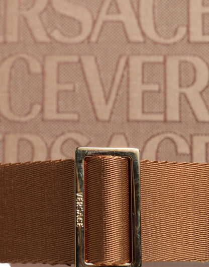 Bolso bandolera marrón con asa superior de piel jacquard y logotipo