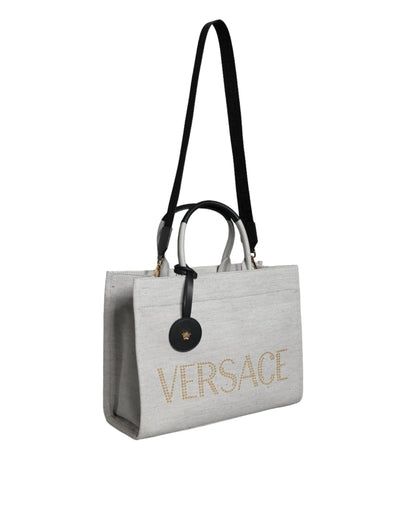 Bolso bandolera de lona blanca con asa superior, de cuero y logotipo