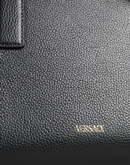 Bolso bandolera pequeño de piel negra con asa superior