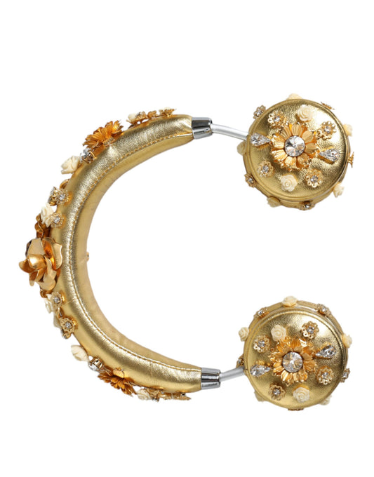 Auriculares de cuero dorado con diseño floral y ángel de cristal
