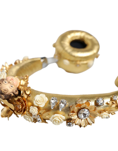 Auriculares de cuero dorado con diseño floral y ángel de cristal