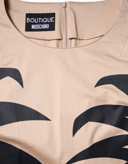 Vestido de algodón beige de manga corta hasta la rodilla